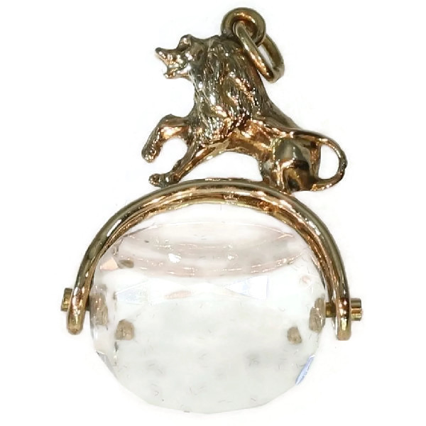 French Victorian rock crystal seal turning under a standing gold lion